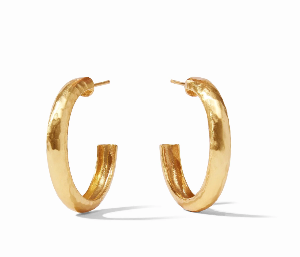 Pair of gold hoop earrings with a hammered texture