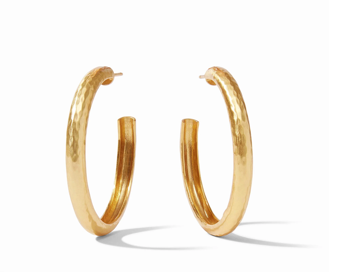 Pair of gold hoop earrings with a hammered texture