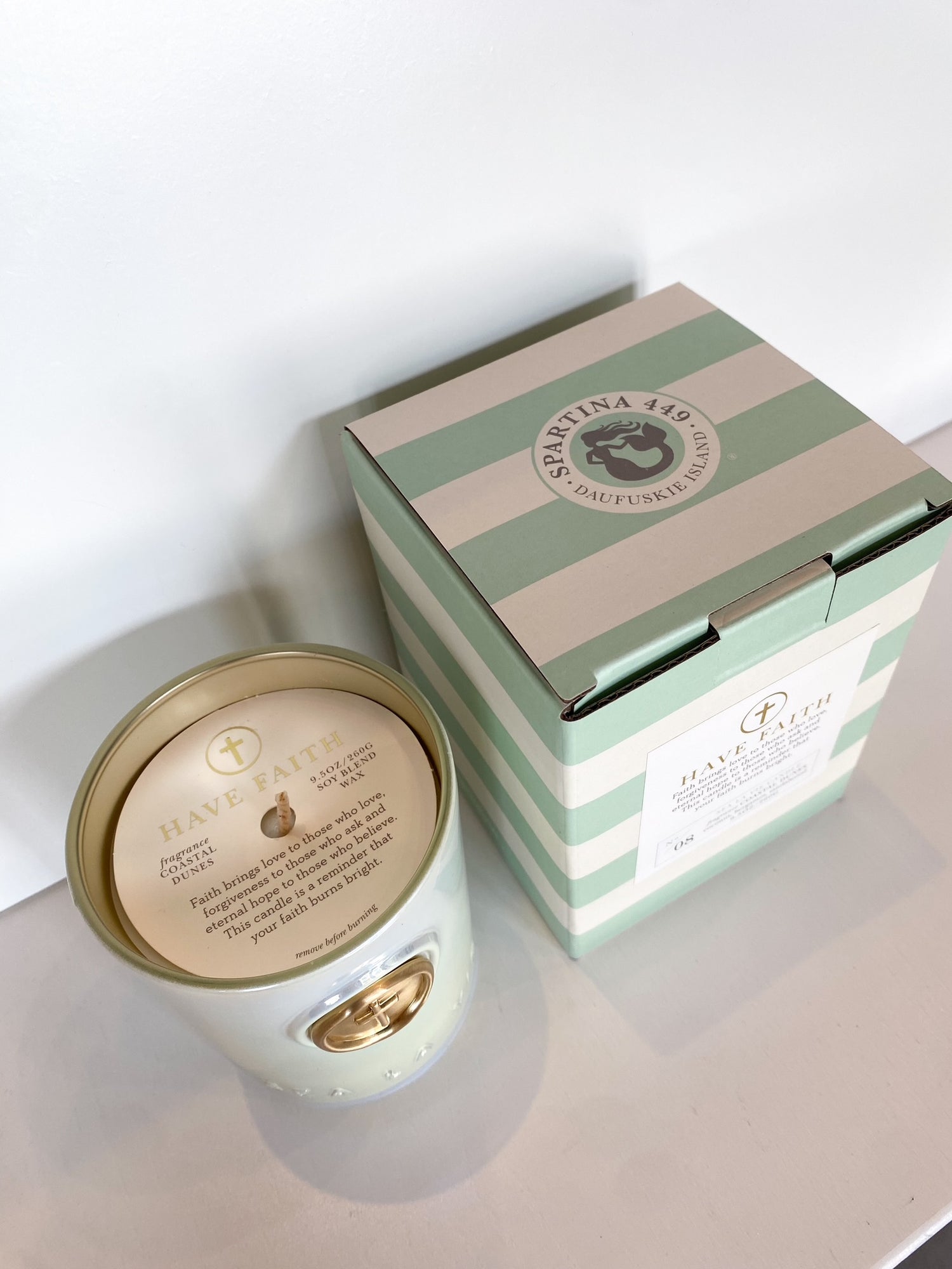 Have Faith scented candle in a striped box with Spartina 449 logo