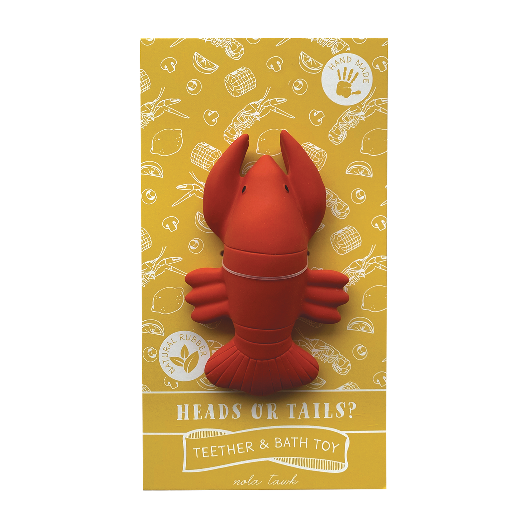 Natural rubber nola tawk teether and bath toy, a vibrant red lobster on sunny yellow packaging featuring white line art of crawfish, lemons, and corn, with 'HEADS OR TAILS?' and 'HAND MADE' text