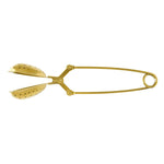 Gold-toned brass tea infuser with perforated spoon-like chambers and a spring-loaded clamp handle