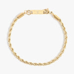 A gold rope chain bracelet with a textured braided design featuring a secure lobster clasp and a rectangular bar etched with a K symbol