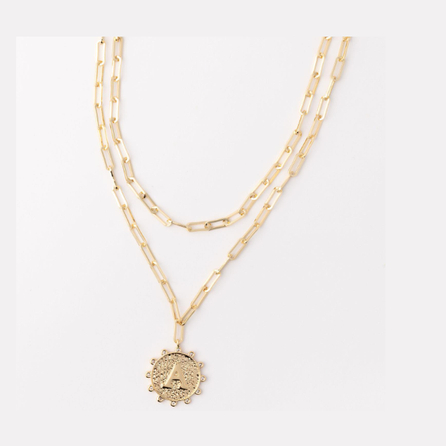 Gold layered paperclip chain necklace with a circular letter A pendant