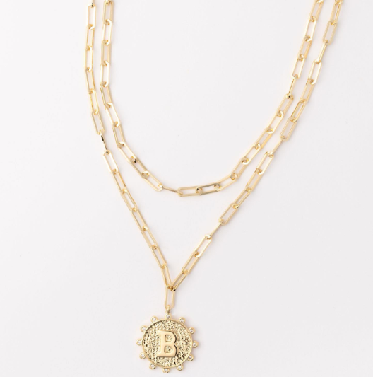 Gold layered paperclip chain necklace with a textured coin pendant featuring the letter B