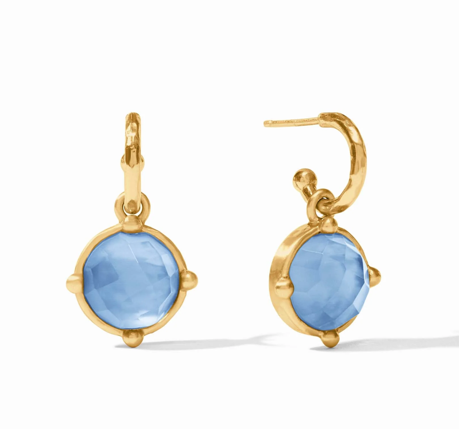 Gold hoop earrings with round blue faceted stone charms