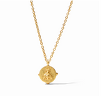 Gold necklace with a round coin pendant featuring a bee motif