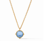 Gold chain necklace with a round blue stone pendant