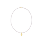 Handcrafted beaded jewelry piece featuring delicate iridescent light pink seed beads, a single polished gold spherical bead at the top, and a small gold cross charm suspended from the bottom against a solid black background