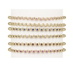 Six stacked bracelets featuring gold beads alternating with small colorful glass beads