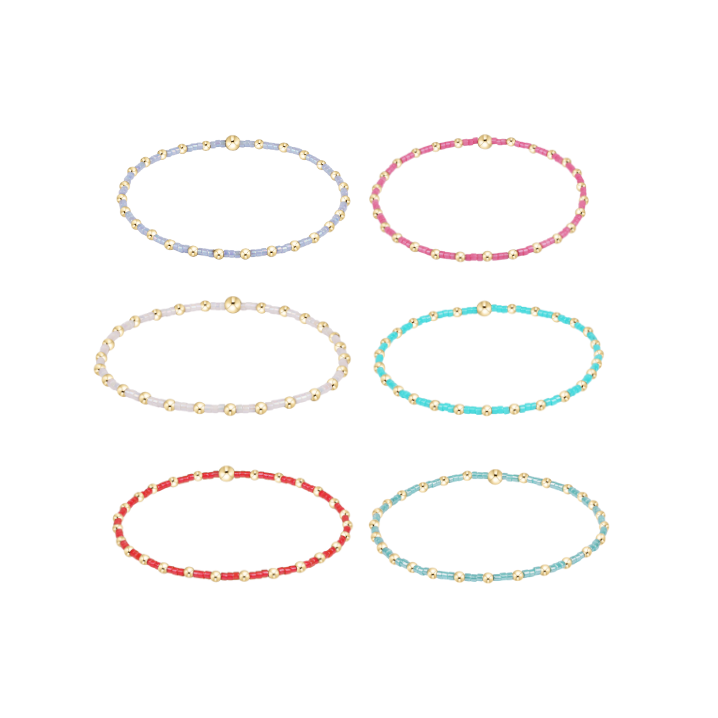 Six stretch bracelets with colorful glass beads and gold tone metal accents