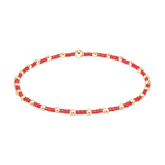 Stretch bracelet with alternating red seed beads and small gold metal spheres