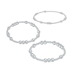 Three silver beaded stretch bracelets with varying bead sizes