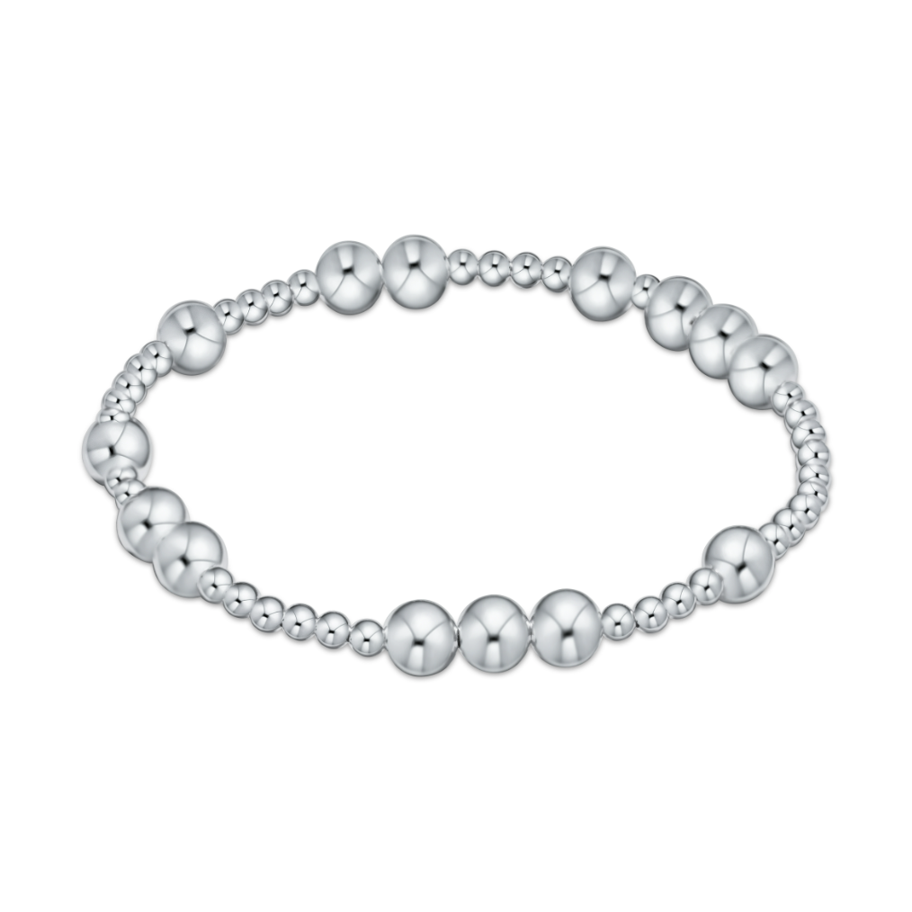 Stretch bracelet made of polished silver beads of varying sizes