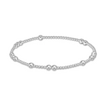 Stretch bracelet with silver beads of varying sizes