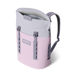 YETI Hopper M20 backpack cooler in blush pink with gray shoulder straps, open MagShield Access, and side HitchPoint Grid webbing