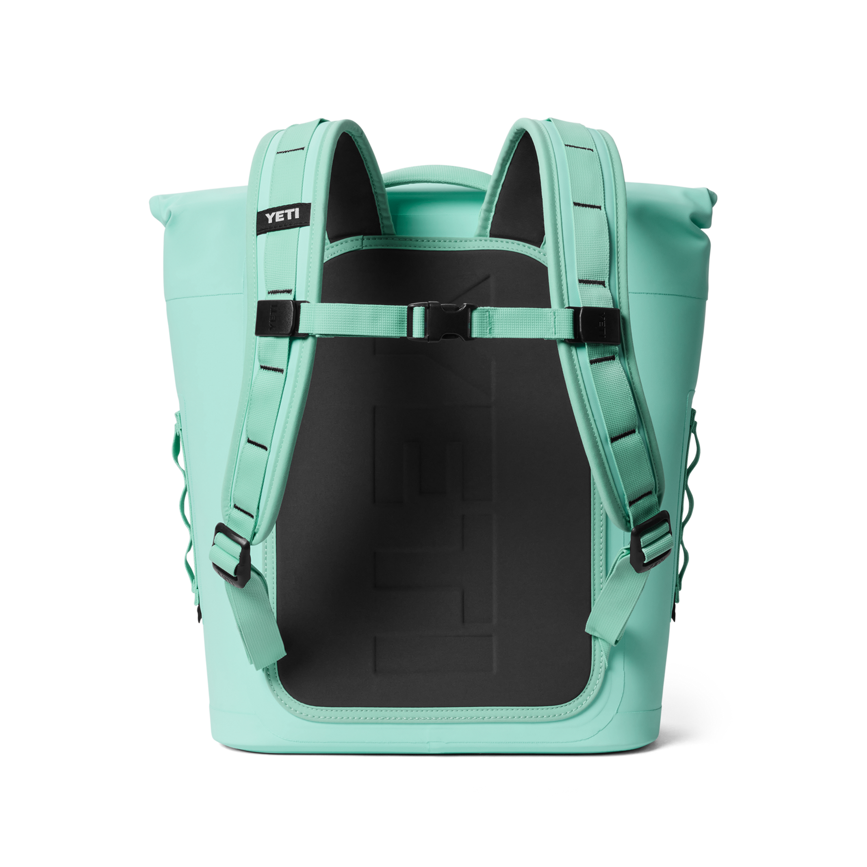 YETI Panga 28 waterproof backpack in vibrant mint green featuring a prominent embossed logo on the black padded back panel and adjustable shoulder straps with a chest buckle