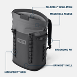 Product photograph of a charcoal grey YETI Panga 28 Backpack with a lighter grey MagShield Access opening and ColdCell insulation, highlighting its durable DryHide shell and side HitchPoint Grid webbing