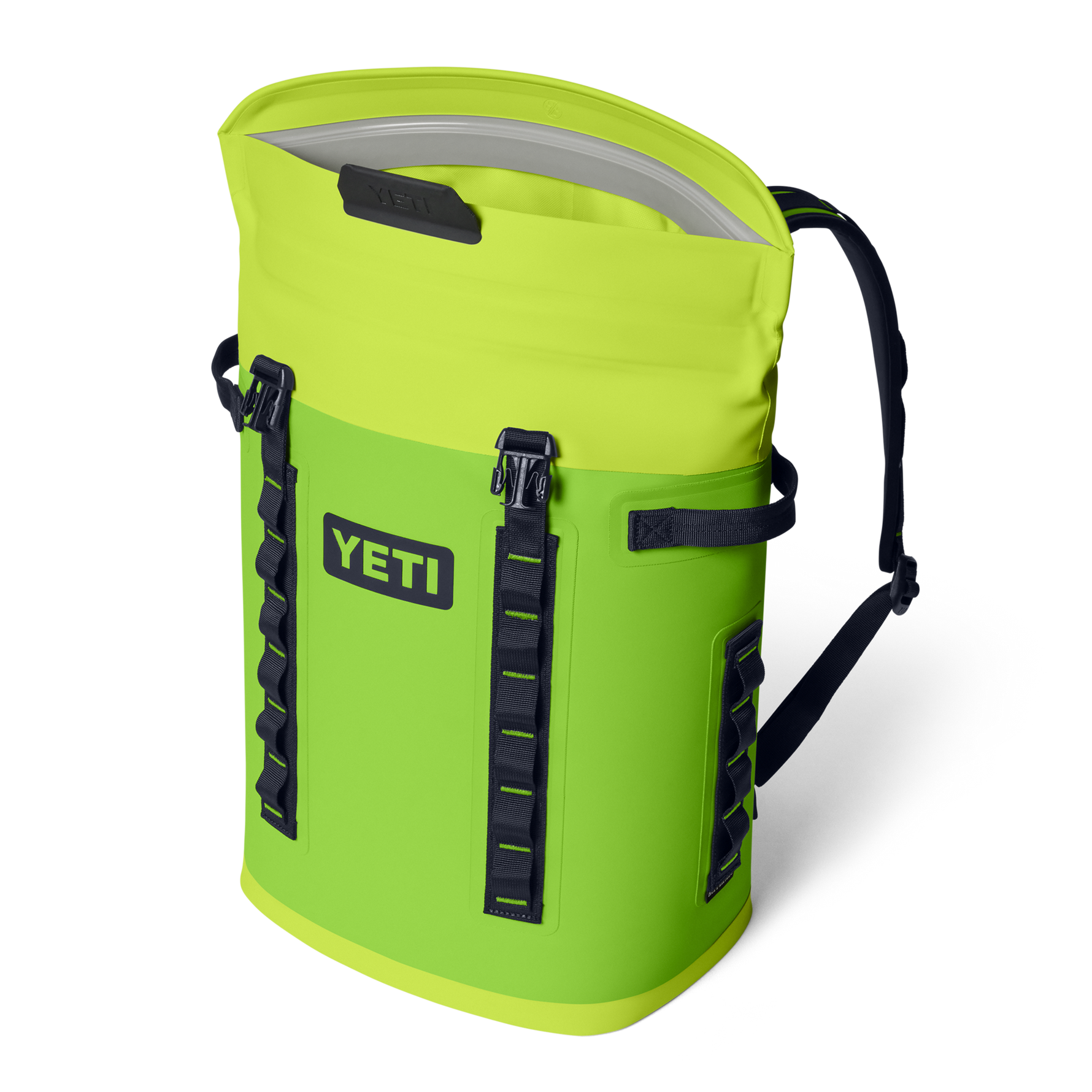 Product photography by YETI of a vibrant lime green waterproof roll-top backpack cooler with a black YETI logo on an isolated black background