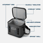 YETI Hopper Flip soft cooler in charcoal grey open on a plain background showcasing its wide-mouth opening Hydrolok zipper and Coldcell insulation