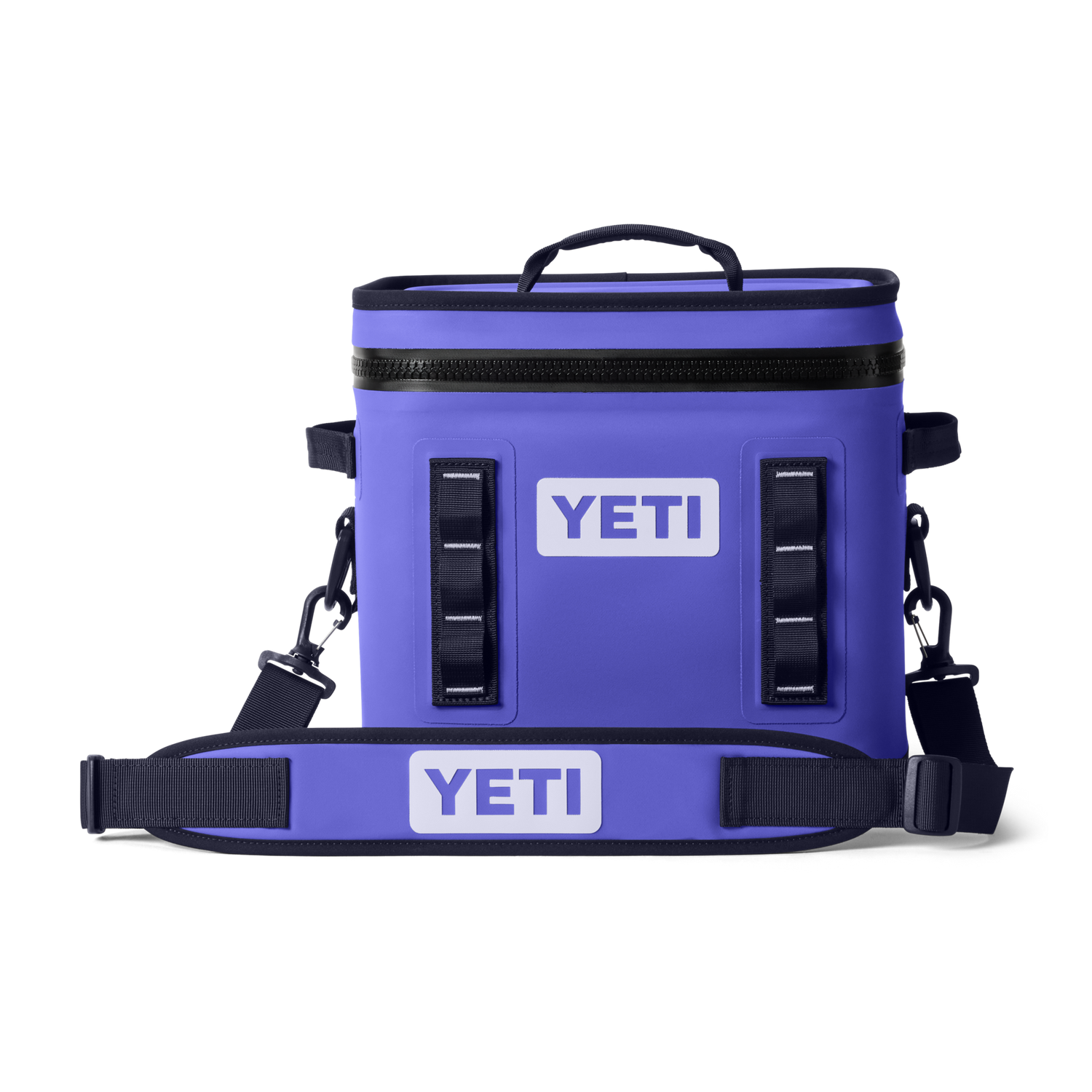Product photography of a vibrant purple Yeti soft cooler bag featuring a white Yeti logo, durable black top zipper, and an adjustable shoulder strap