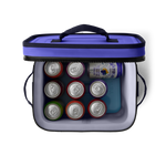 A studio shot of a vibrant purple cooler holding an array of colorful beverage cans including Waterloo Blackberry Lemonade and a blue Yeti ice pack