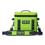 Product image of a vibrant fluorescent green YETI Hopper Flip 12 soft cooler featuring a prominent black YETI logo, a robust black top zipper, and a padded black adjustable shoulder strap