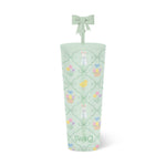 Swig brand light green tumbler featuring an Easter pattern of white bunnies yellow chicks colorful tulip bouquets and Easter baskets connected by delicate green ribbons topped with a matching green bow on the straw