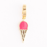Gold-tone metal dangle charm featuring a vibrant pink enamel scoop of ice cream on a textured waffle cone design
