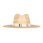 Woven straw fedora style hat with a creased crown and wide brim adorned with a cream fabric band featuring colorful vertical stripes in blue purple pink and turquoise