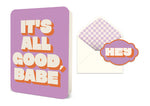 Greeting card with purple background and text It is all good babe next to an envelope with a checkered liner