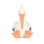 Jellycat plush toy of a white pelican isolated on a white background featuring a fluffy white body with grey wing tips, a long orange beak, and orange webbed feet