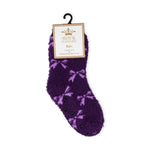 Royal Standard Kid's Snuggle Sock, deep purple and fluffy, features light purple bow patterns and black anti-slip grips