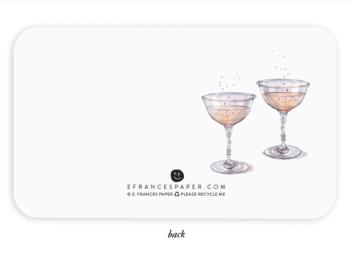 Watercolor illustration of two champagne coupes on the back of a greeting card