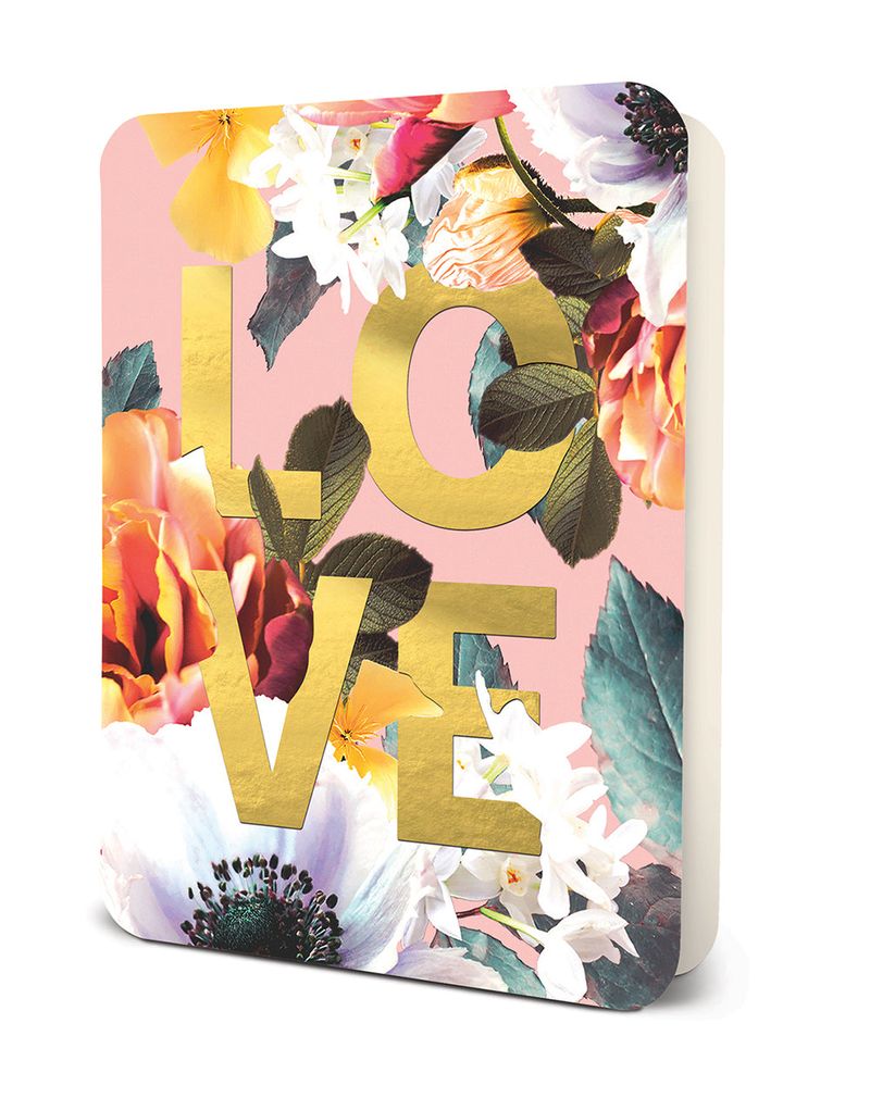 Notebook with pink background and gold foil text reading LOVE surrounded by floral illustrations