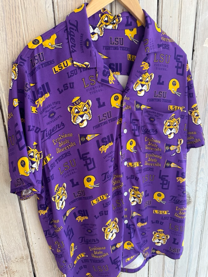 Purple short sleeve button down shirt with LSU Tigers logos and text pattern