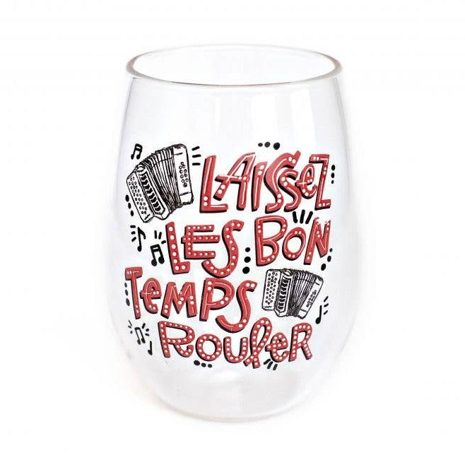 Clear stemless wine glass decorated with the phrase Laissez Les Bon Temps Rouler in a red bubbly outline font, flanked by two black and white accordions and scattered music notes