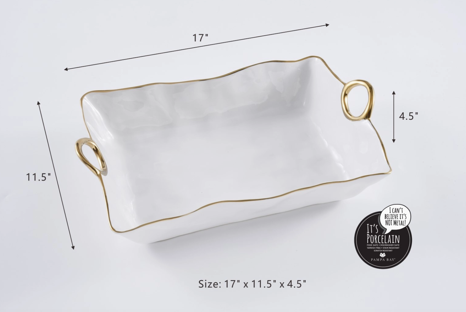 Pampa Bay porcelain rectangular serving dish with a hammered white finish wavy gold-rimmed edge and two gold loop handles measuring 17 by 11.5 by 4.5 inches