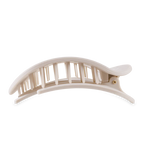 A large beige plastic hair claw clip featuring a curved minimalist design and a visible gold-toned hinge pin
