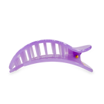 Translucent plastic hair accessory a light purple claw clip with a golden pivot and an arched design featuring interlocking teeth