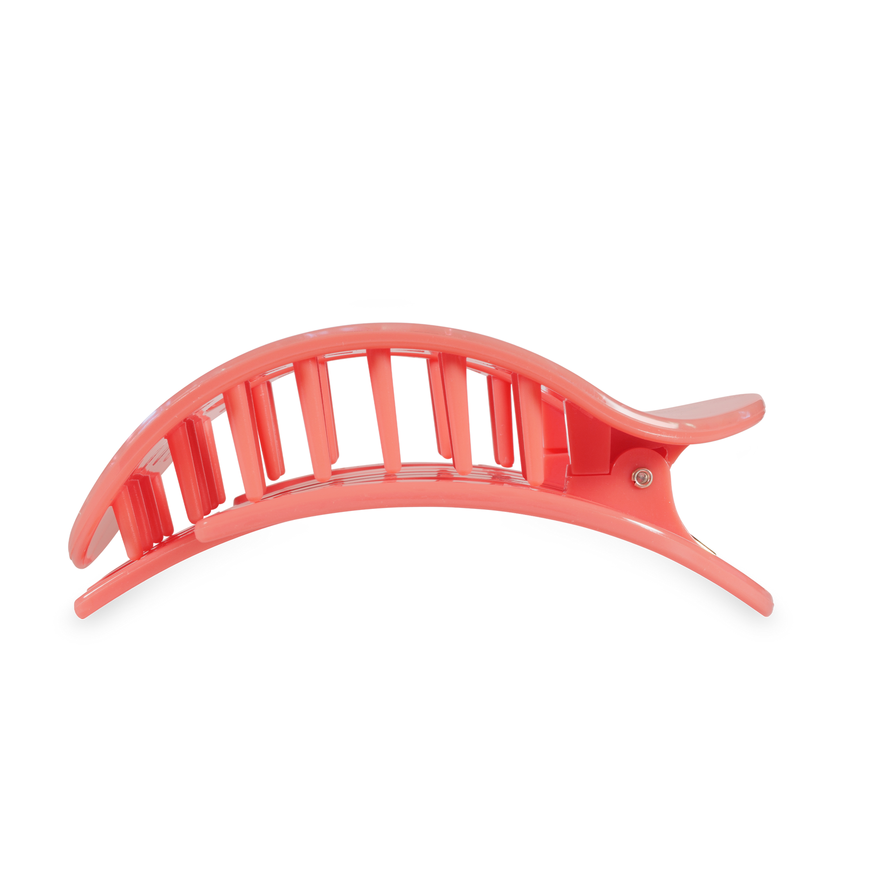 A large coral pink plastic hair claw clip featuring a curved, ribbed top jaw and visible hinged teeth