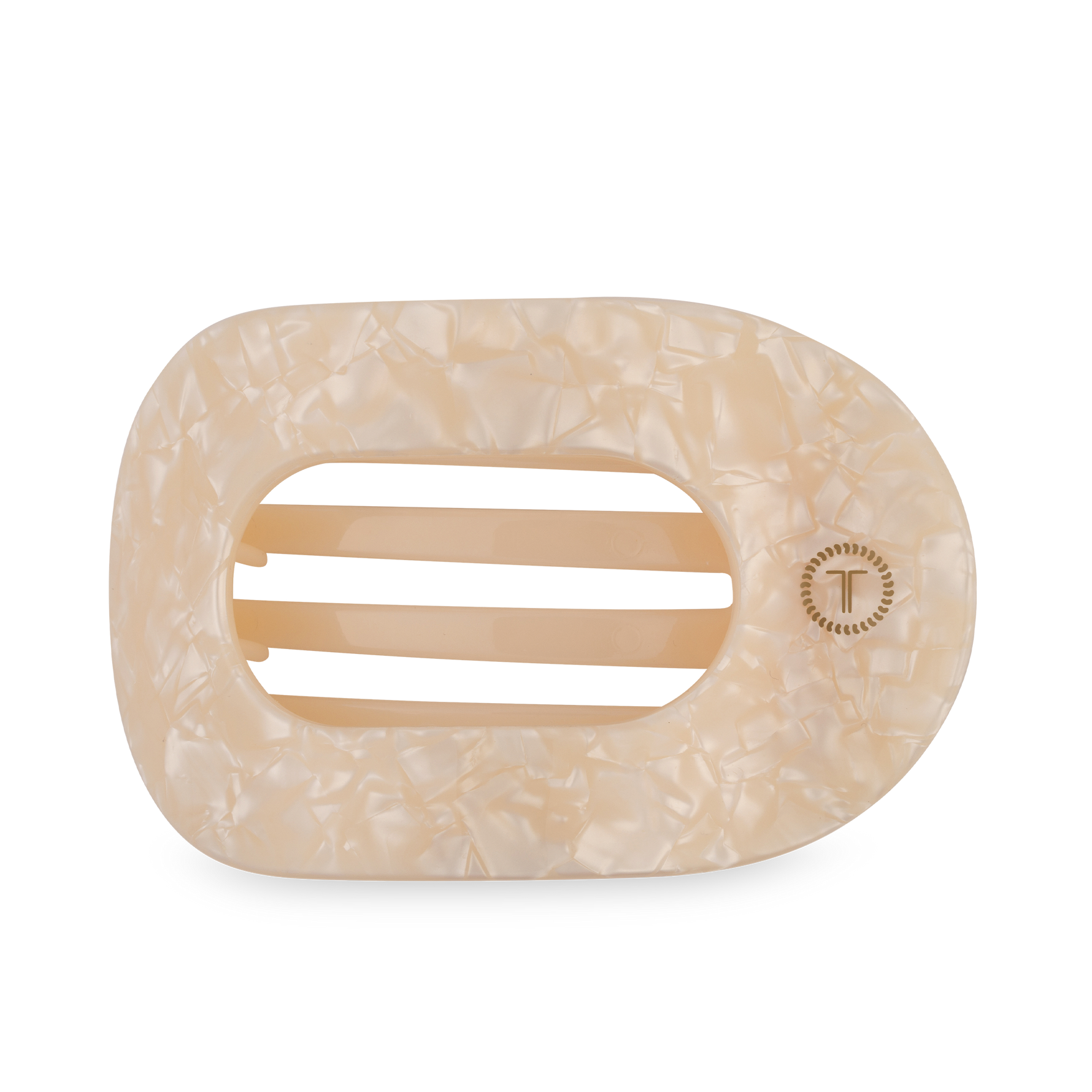 Mother-of-pearl patterned cream and beige oval soap dish with interior drainage ridges and a gold T logo bordered by small dots