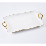 White ceramic serving tray with a glossy finish, wavy gold rim, and two irregular gold loop handles