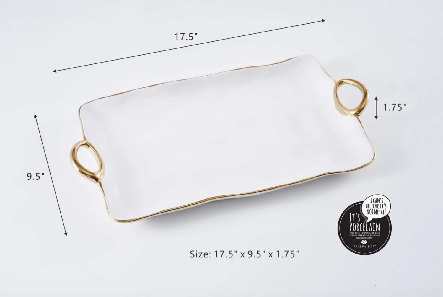 Pampa Bay white porcelain rectangular serving tray with wavy gold trim and two round gold handles measuring 17.5 x 9.5 x 1.75 inches showcasing its metal-like appearance