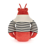 Plush toy red lobster with antennae wearing a cream and navy striped long-sleeved shirt seen from the back