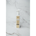 Tyler Candle Company Glam On Demand Diva linen and room spray bottle on a marble surface