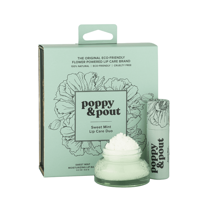 Poppy & Pout Sweet Mint Lip Care Duo product photo features a light mint green box with poppy line art, a clear glass jar of lip balm with white product piled on top, and a matching cylindrical lip balm stick on a dark green background