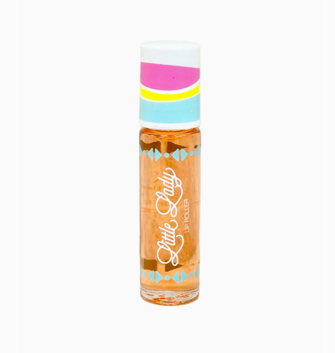 Little Lady lip roller with orange tinted gloss and a colorful patterned cap