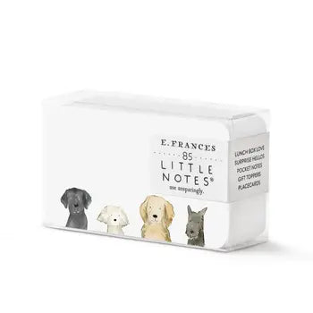 E. FRANCES stationery product photography showing a clear rectangular box of 85 Little Notes featuring watercolor illustrations of four distinct dogs including a golden retriever and a gray terrier with suggested uses like Lunch Box Love and Gift Toppers