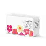 E. FRANCES 85 Little Notes stationery set in a clear box on a white background featuring a border of vibrant pink, yellow, and orange watercolor flowers, the motto "use unsparingly," and versatile uses like Lunch Box Love and Gift Toppers