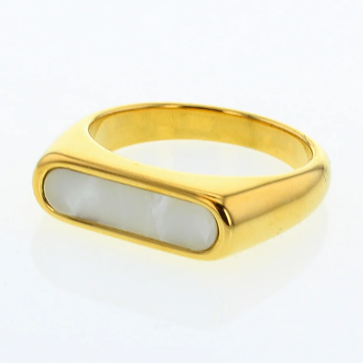 Jewelry: A sleek gold ring featuring a rectangular iridescent mother-of-pearl inlay against a white background